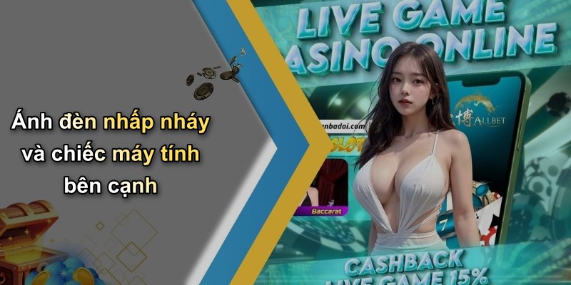Ánh đèn nhấp nháy và chiếc máy tính bên cạnh